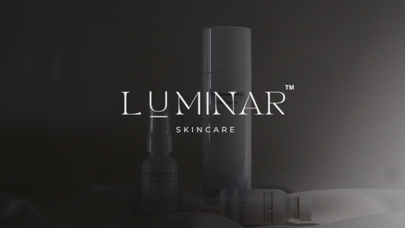 A video showcasing the Luminar Collection in action. Clips feature products being applied to the skin, textures being smoothed onto hands and faces, and bottles elegantly displayed. The footage highlights the clean, nourishing formulas, including ozonized sunflower oil and hydrating serums, designed to support healthy, glowing skin.